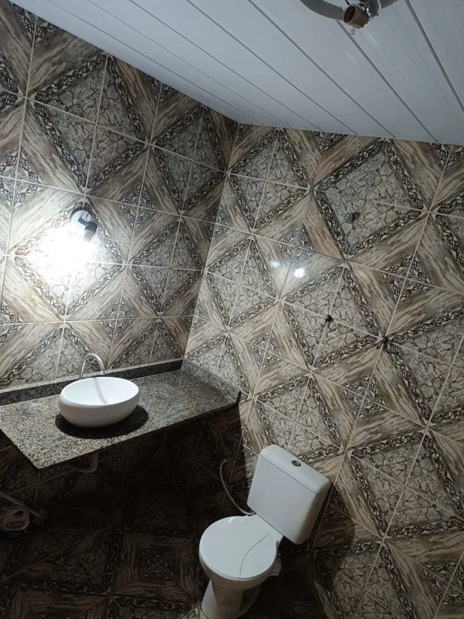 Imagem Casa em Condomínio para Venda em Itaboraí, Centro (Manilha), 4 dormitórios, 1 suíte, 2 banheiros, 1 vaga