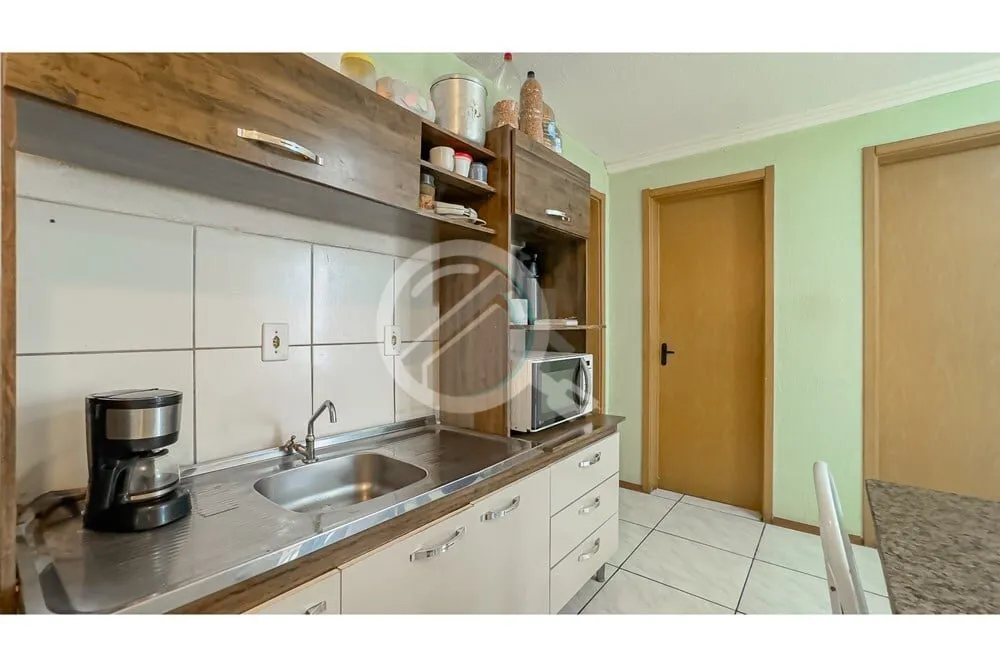 Imagem Descubra o seu novo lar no bairro Partenon. Este apartamento residencial à venda apresenta uma opor...