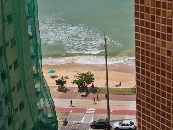 Imagem 3 quartos sendo duas suítes vista lateral para o mar