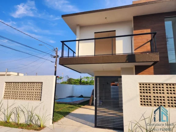 Foto do imóvel Sobrado novo 03 quartos c/suíte, arquitetura moderna, 2 quadras MAR, Nereidas em Guaratuba PR