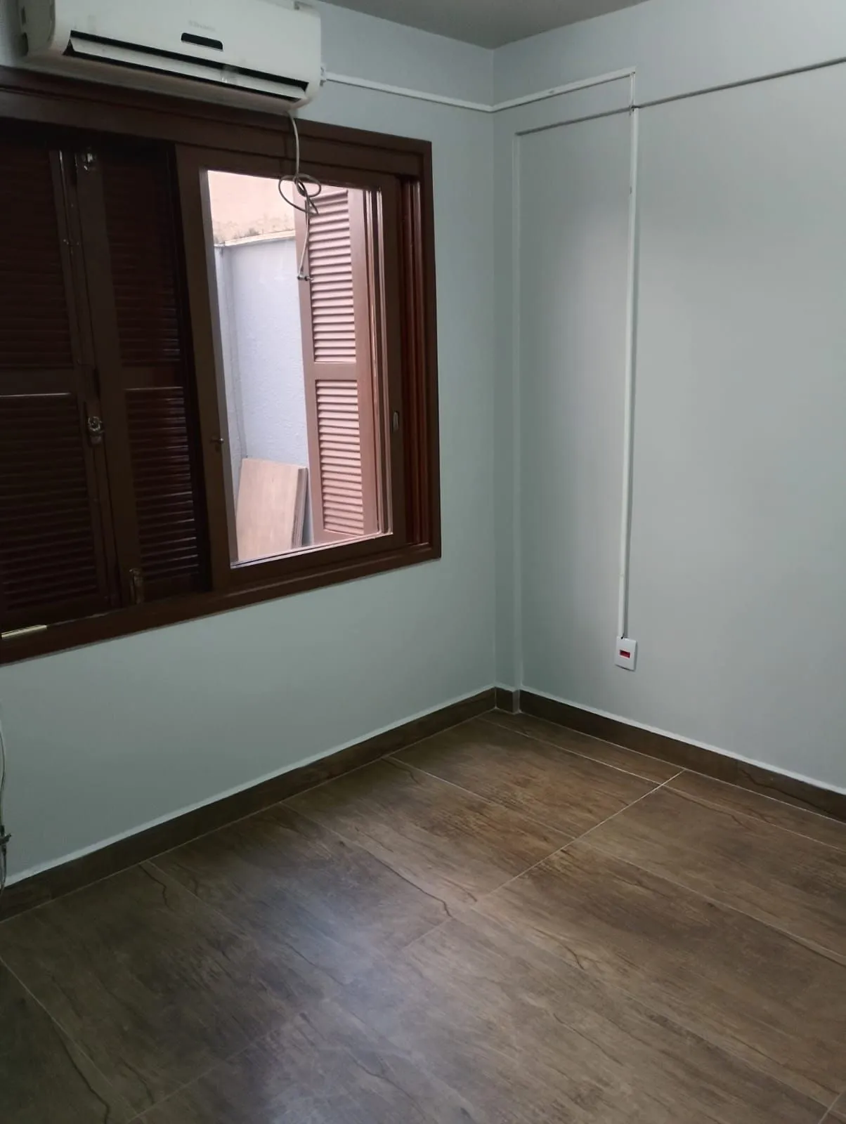 Imagem Apartamento Térreo, 02 dormitórios, 60,59m2 área privativa, quiosque com churrasqueira, Menino Deus