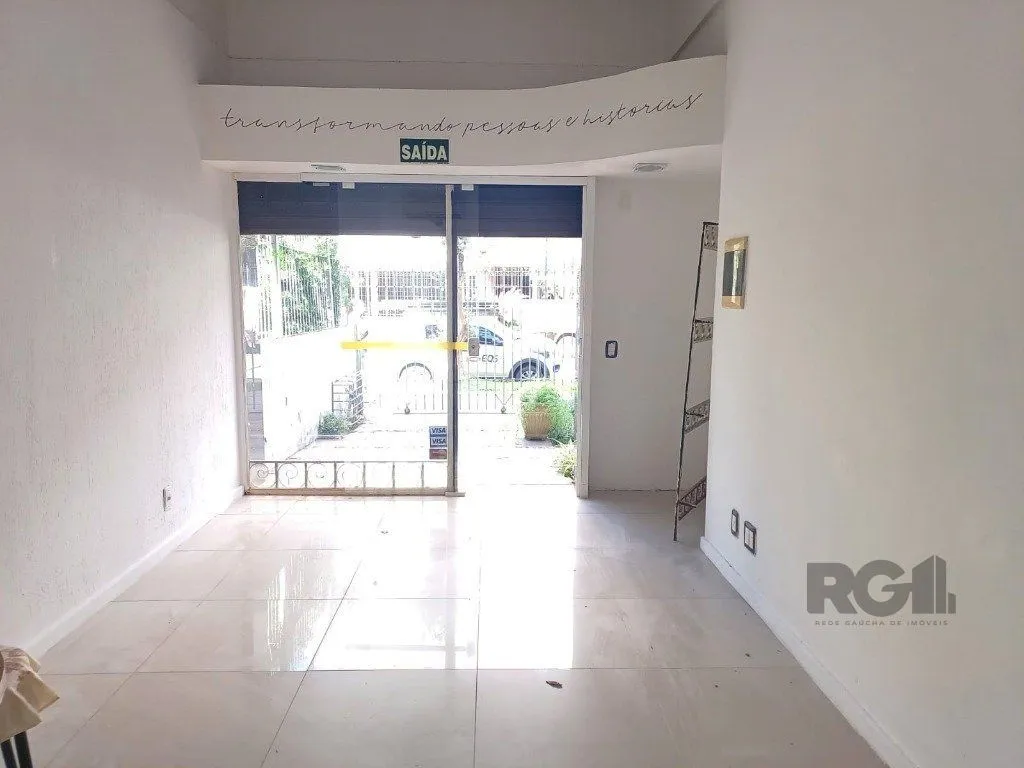 Imagem Sala de frente com vaga