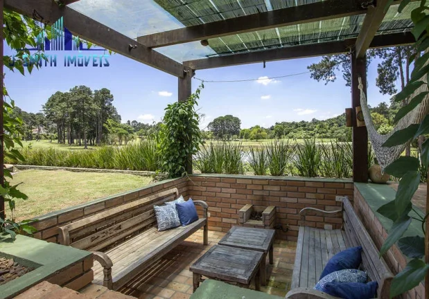 Imagem MANSÃO ESPETACULAR. ADEGA, PISCINA COM VISTA PARA O CAMPO DO GOLF CLUB