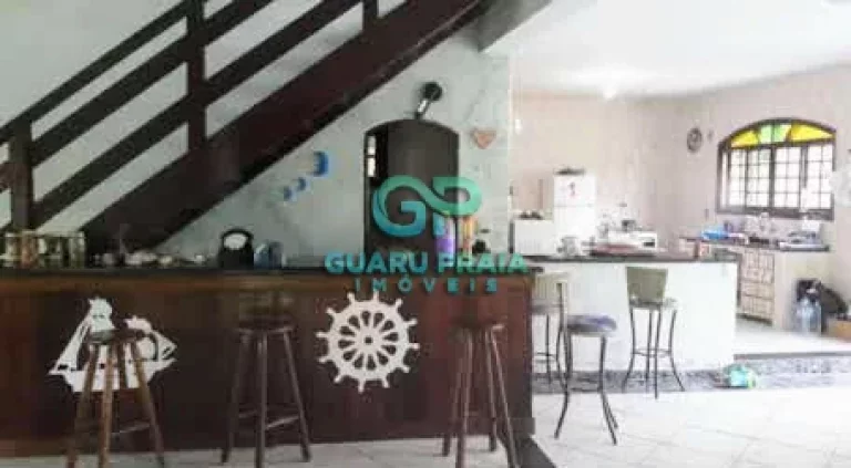 Imagem Casa com 6 quartos sendo 4 suítes, sala de jantar, sala de estar, sala de TV, 5 banheiros, cozinha armário planejado, lavanderia, churrasqueira, piscina, lindo jardim arborizado