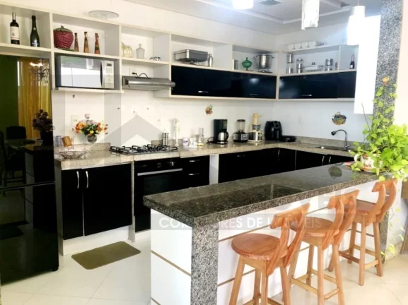 Foto do imóvel CASAL IMÓVEIS VENDE CASA TERREA MONTENEGRO BOULEVARD 3 SUÍTES