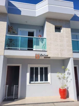 Foto do imóvel Sobrado com 2 suítes à venda, 100 m² por R$ 530.000 - Praia das Palmeiras - Caraguatatuba/SP