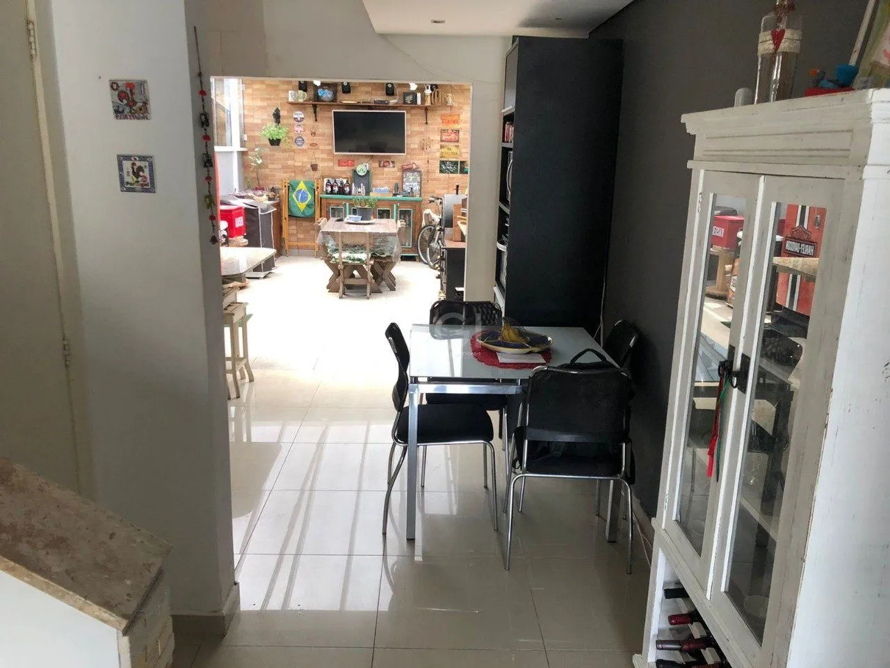 Imagem Casa com 3 dormitórios 2 suítes, área gourmet, vaga de estacionamento, Guarujá, Porto Alegre RS