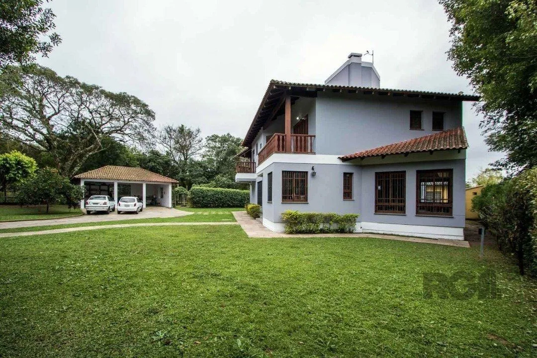 Imagem Sobrado com 6 suites, lareira, lavabo, pátio - Bairro Belém Velho