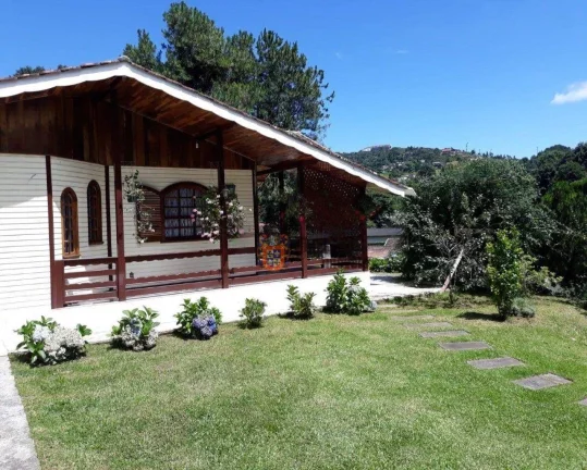 Imagem Casa com 3 dormitórios à venda, 235 m² por R$ 1.250.000,00 - Alto Do Capivari - Campos do Jordão/SP