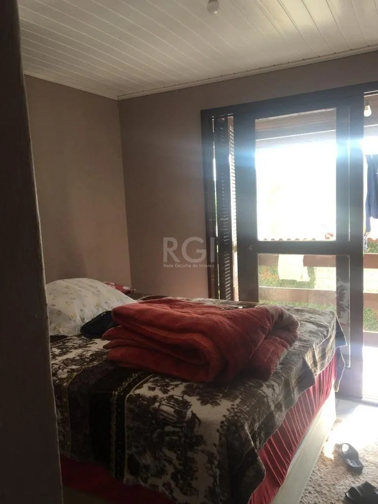 Imagem Sobrado para Venda - 92m², 3 dormitórios, 2 vagas - Restinga Nova