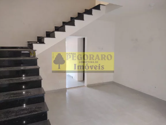 Imagem Sobrado à venda em Caraguatatuba-SP: 2 quartos, 2 suítes, 3 banheiros, 75m² no bairro Cidade Jardim!