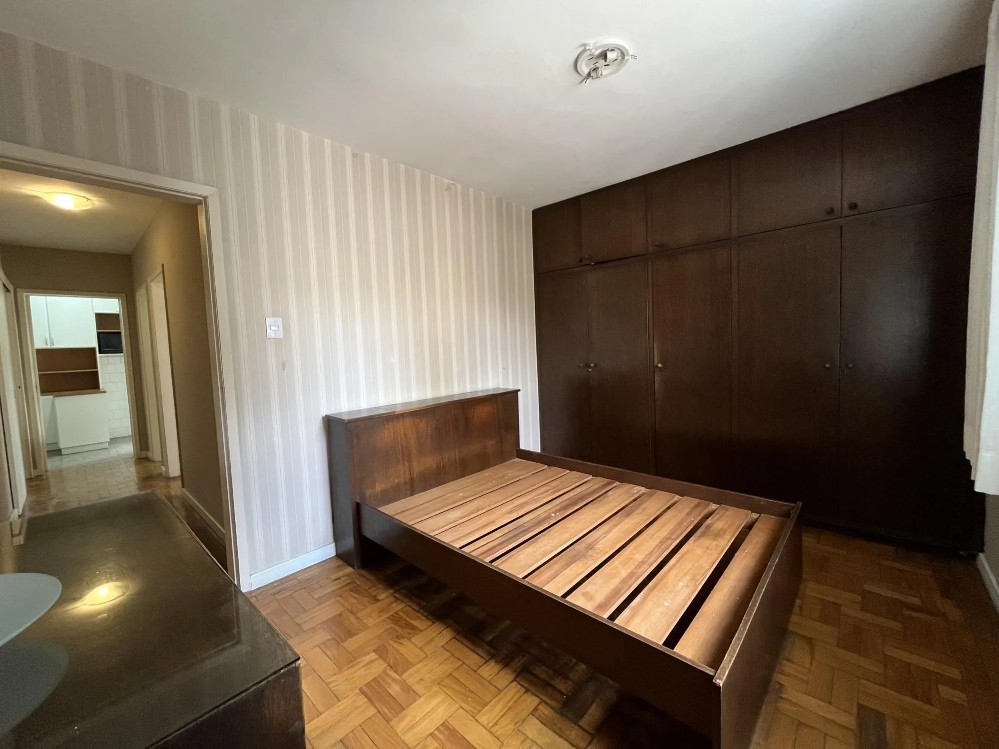Imagem Apartamento de dois quartos e uma vaga de garagem no bairro Auxiliadora em POA