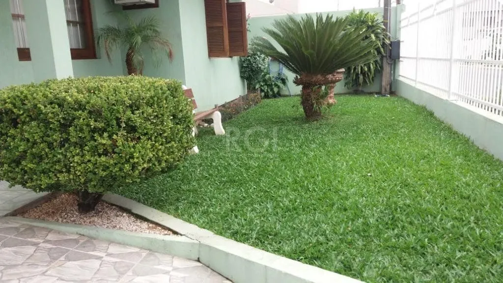 Imagem Casa com 3 dormitórios à venda, 230,11 m² por R$ 900.000,00 - Igara III - Canoas/RS