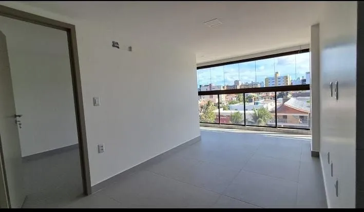 Imagem Apartamento moderno a 80m da praia no Jardim Oceania, com 2 suítes, varanda gourmet e lazer completo. Ideal para morar ou investir.