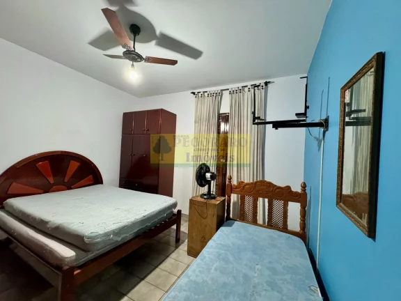Imagem Sobrado de 2 quartos em condomínio fechado na Martim de Sá, Caraguatatuba-SP: 400mts da Praia, 76m², 1 vaga - Imperdível!
