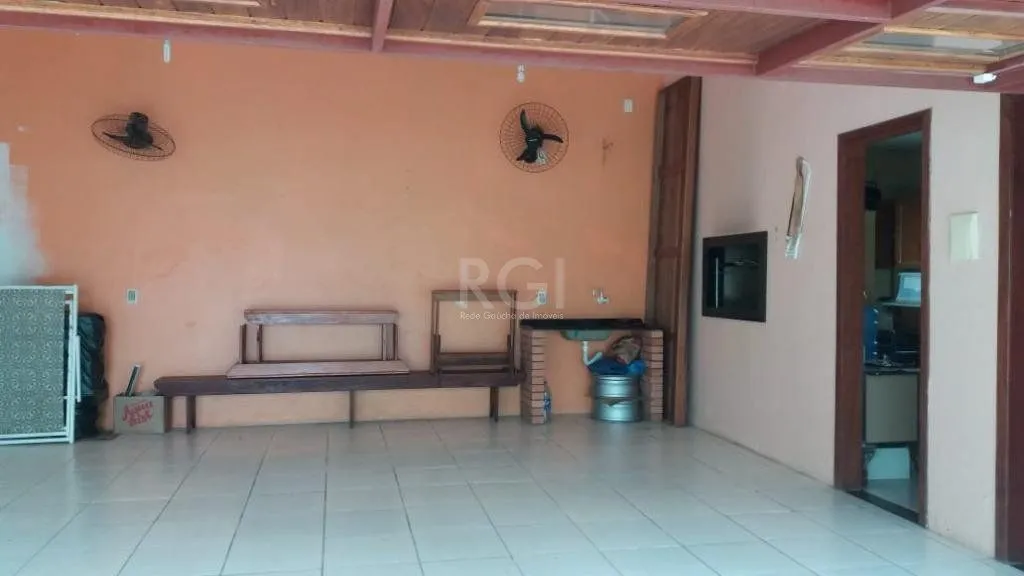 Imagem Casa com 3 dormitórios à venda, 230,11 m² por R$ 900.000,00 - Igara III - Canoas/RS
