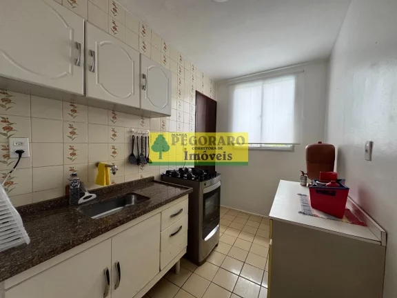Imagem Apartamento à venda em Caraguatatuba-SP, bairro Prainha 2 quartos, 1 sala, 1 banheiro, 1 vaga de garagem, 53,00 m².