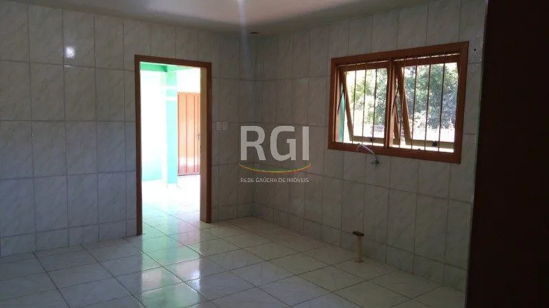 Imagem Casa para Venda - 100m², 3 dormitórios, 2 vagas - Centro