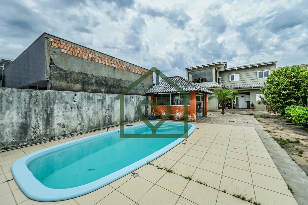 Imagem Sobrado com piscina, espaço gourmet completo e vista panorâmica ? oportunidade imperdível! 
 
Exc...