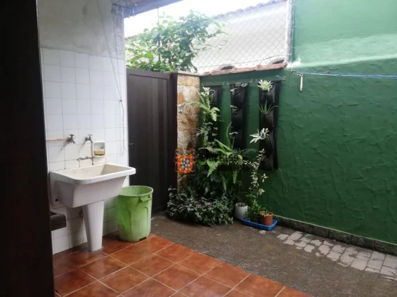 Imagem Casa com 4 dormitórios à venda, 160 m² por R$ 1.000.000 - Balneário Praia do Pernambuco - Guarujá/SP