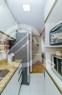 Imagem Apartamento com 57m², dois dormitórios sendo uma suíte, living, cozinha tipo americana, área de ...