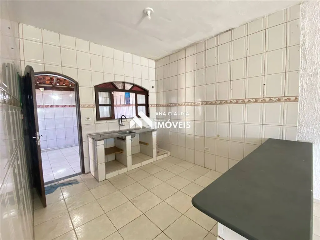 Imagem Casa a Venda Lote inteiro com picina.