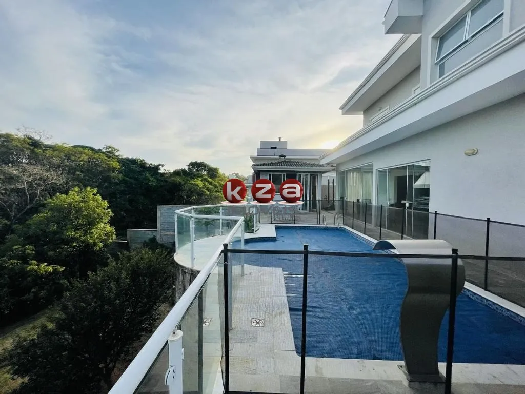 Imagem Casa de luxo no Condomínio Terras de Santa Teresa em Vinhedo, com 4 suítes, 3 salas e 350m² de área privativa. Venha conferir!
