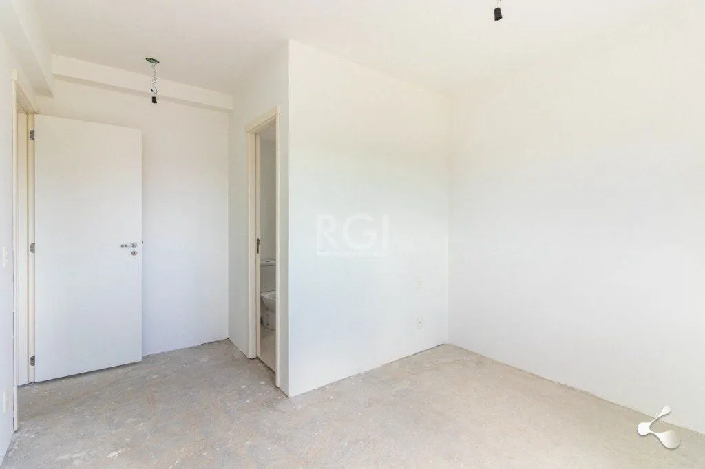 Imagem Vende apartamento, 03 dormitórios, living para dois ambientes, banheiro social, cozinha com churrasqueira e área de serviço e garagem.