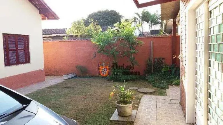 Imagem Casa com 3 dormitórios à venda, 161 m² por R$ 690.000,00 - Indaiá - Bertioga/SP