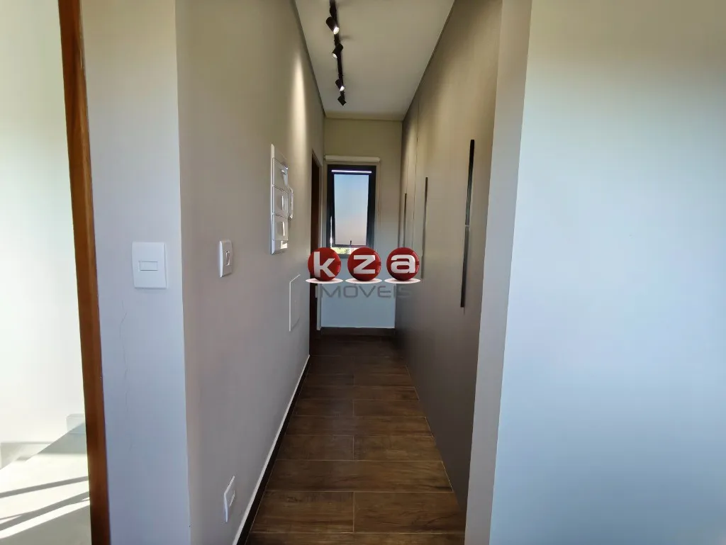 Imagem Casa a venda em Condomínio de Alto Padrão em Vinhedo-SP: 3 Suítes, 2 Salas, gourmet com churrasqueira e piscina.