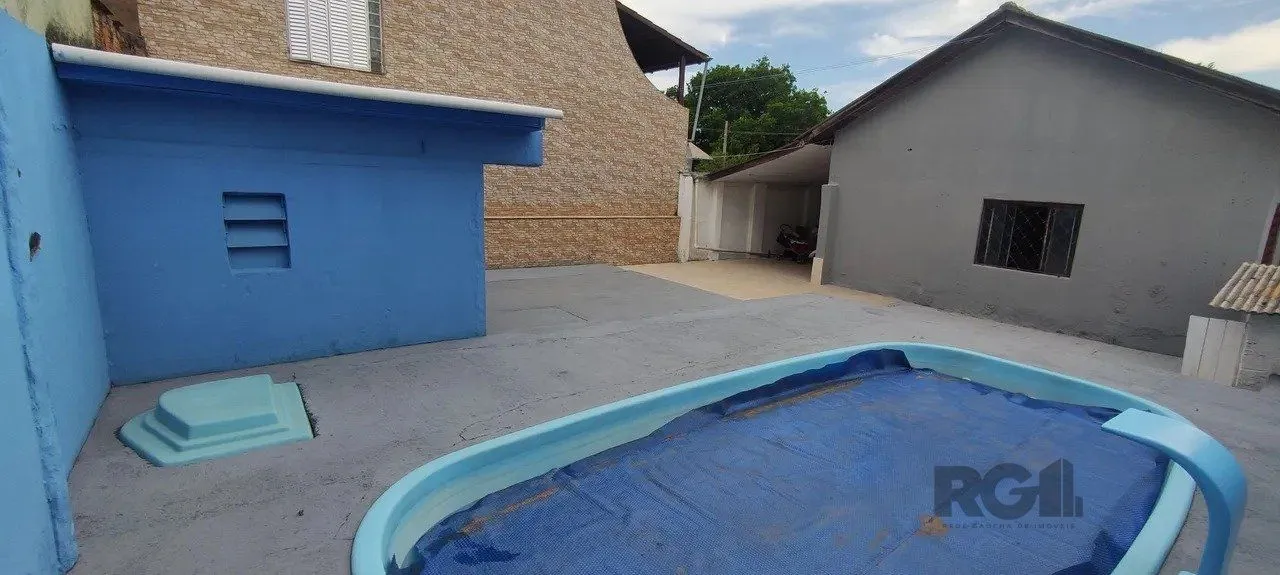 Imagem Casa com 2 quartos, vagas de garagem, piscina, bairro Sarandi, Porto Alegre/RS