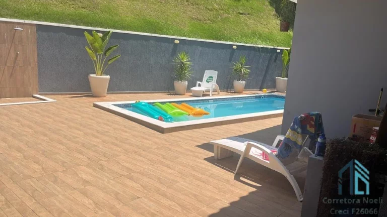 Imagem Casa em Condomínio a venda, 04 quartos sendo duas suítes, piscina em Cajati SP