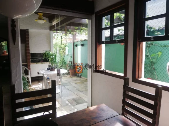 Imagem Casa com 4 dormitórios à venda, 160 m² por R$ 1.000.000 - Balneário Praia do Pernambuco - Guarujá/SP