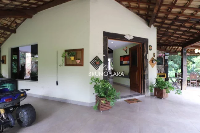 Imagem Casa à venda em Mário Campos Condomínio Serra dos Bandeirantes
