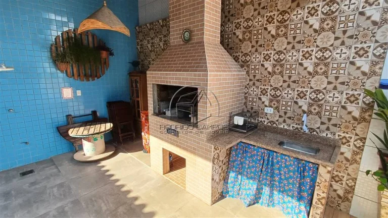 Imagem Espaçosa Casa Geminada no Mirim Praia Grande – 2 Quartos e Piscina