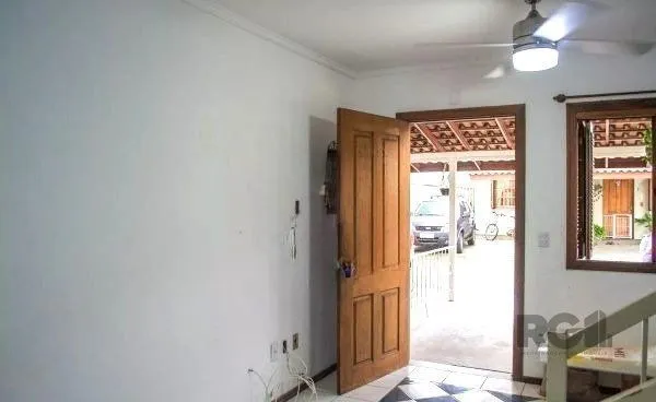 Imagem Casa em condominio no bairro Tristeza de 3 dormitórios e vaga