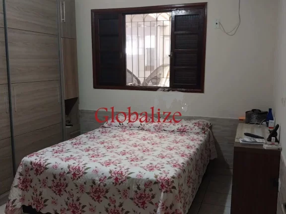Imagem Casa térrea à venda com 125m², 2 quartos, churrasqueira, área coberta, vaga de garagem coberta por R$390.000,00 em Santos