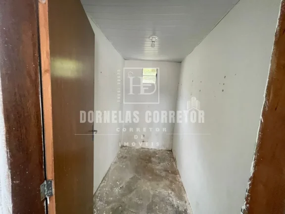 Imagem Oportunidade! Terreno + 3 Casas Prontas para Morar ou Alugar