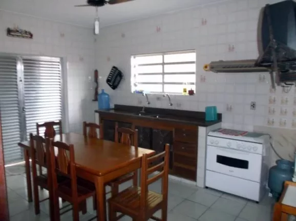 Imagem casa lado praia- tres dormitorios