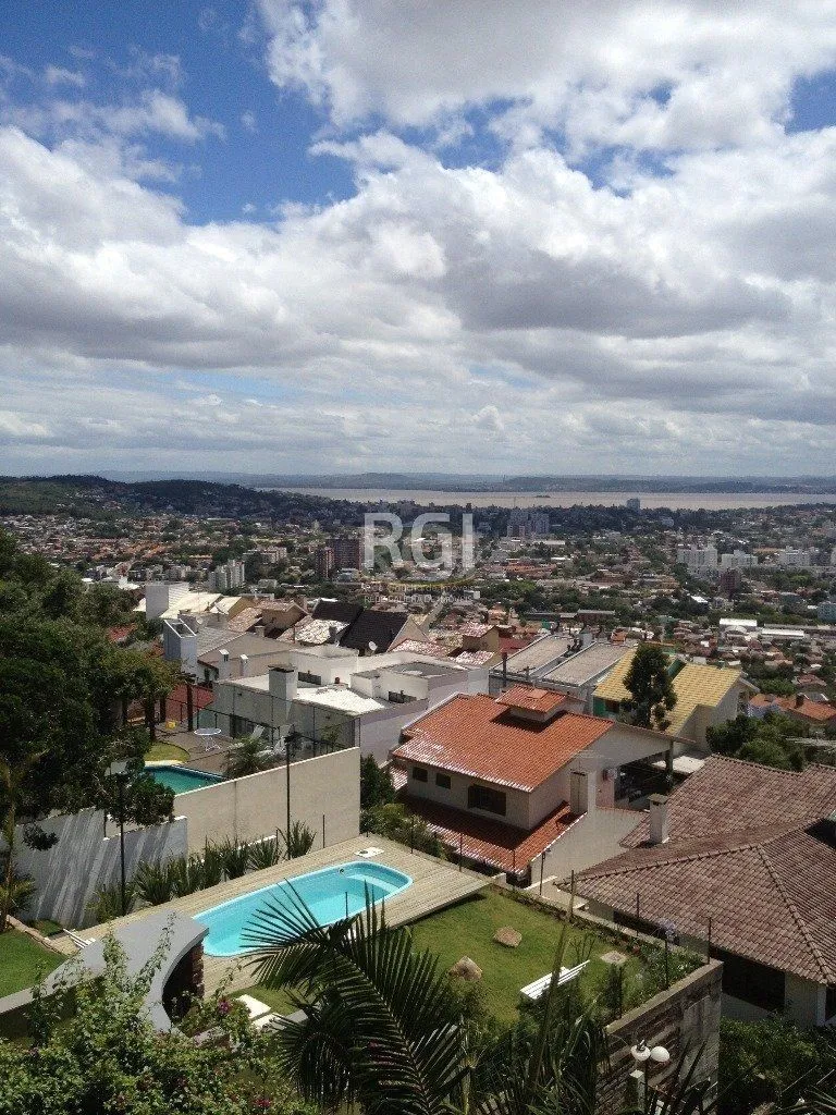 Imagem Casa Condominio para Venda - 350m², 4 dormitórios, sendo 1 suites, 2 vagas - Nonoai