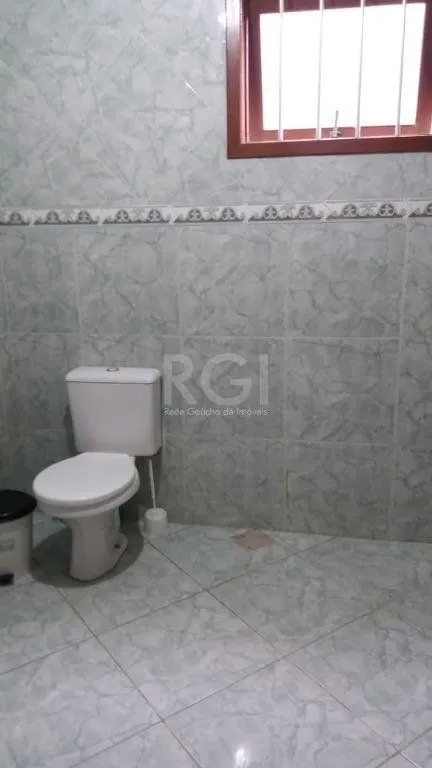 Imagem Casa com 3 dormitórios à venda, 230,11 m² por R$ 900.000,00 - Igara III - Canoas/RS