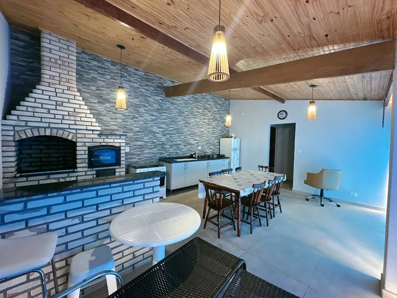 Imagem Belíssima Casa no Condomínio Porta do Sol com piscina e casa de hóspedes