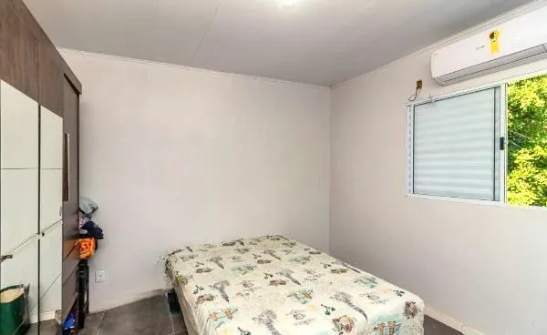 Imagem Casa no bairro Jardim Carvalho de 2 dormitórios e amplo pátio