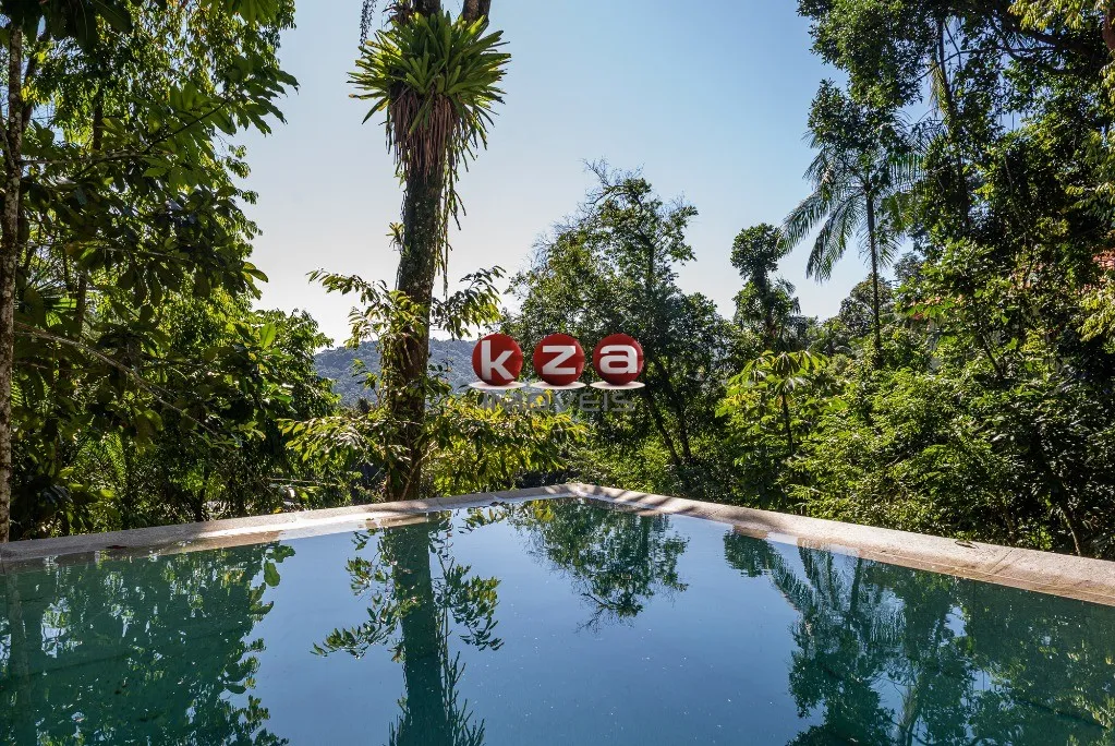 Imagem Casa em Condomínio de Luxo em Bertioga-SP com 4 Quartos, 4 Suítes e 550m² de Área