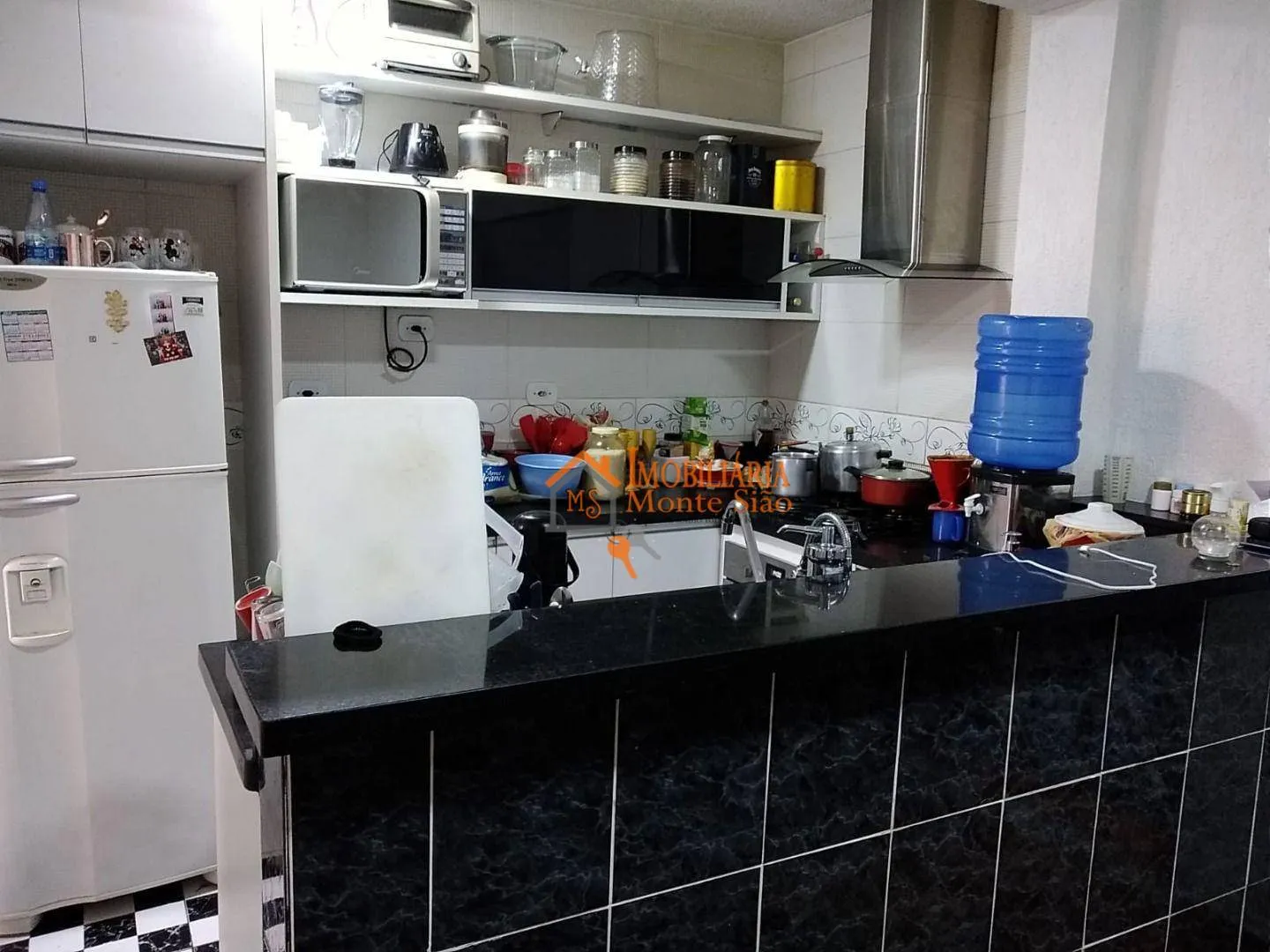 Imagem Sobrado com 4 dormitórios à venda, 300 m² por R$ 650.000,00 - Cocaia - Guarulhos/SP