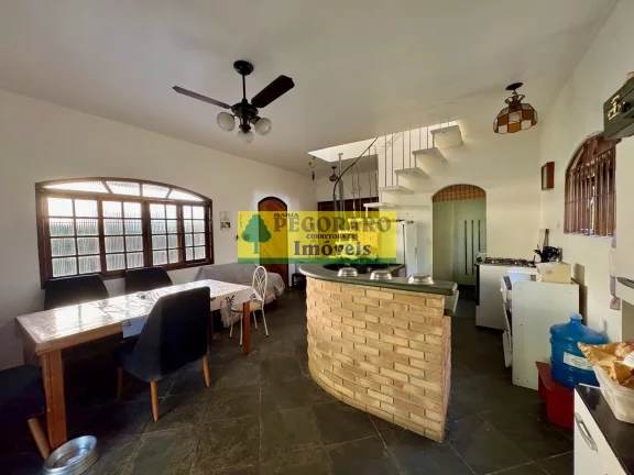 Imagem Casa à venda em Caraguatatuba Martim de Sá 3 quartos, 3 suítes, 1 sala, 3 banheiros, 10 vagas de garagem. 166m² de área.
