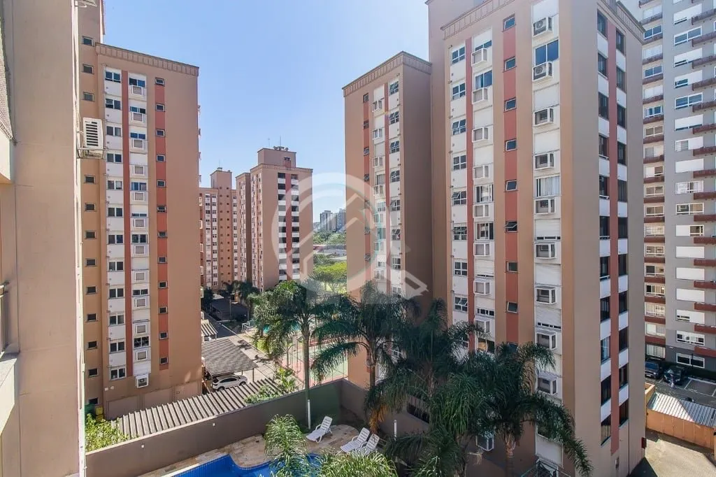 Imagem Apartamento semimobiliado com 61m², 2 dormitórios sendo 1 suíte, 1 vaga! Living para 2 ambientes ...