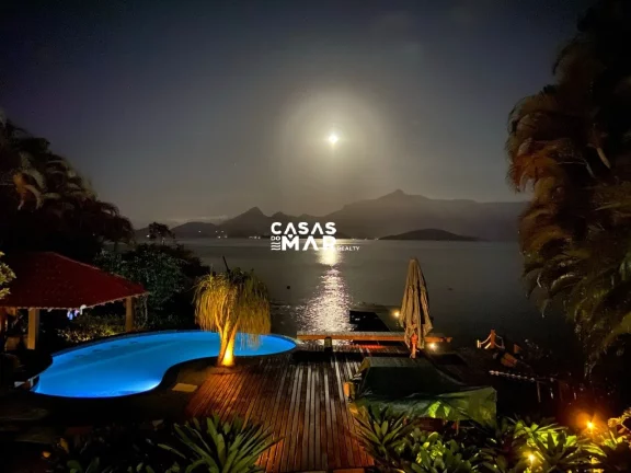 Foto do imóvel Casa Frente Mar Tanguá Angra dos Reis-RJ: 5 suítes + dependência, piscina, churrasqueira, píer e mais!