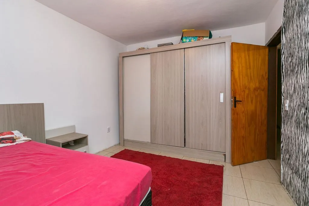 Imagem Casa de 2 dormitórios à venda Bairro no Vila Nova - Porto Alegre