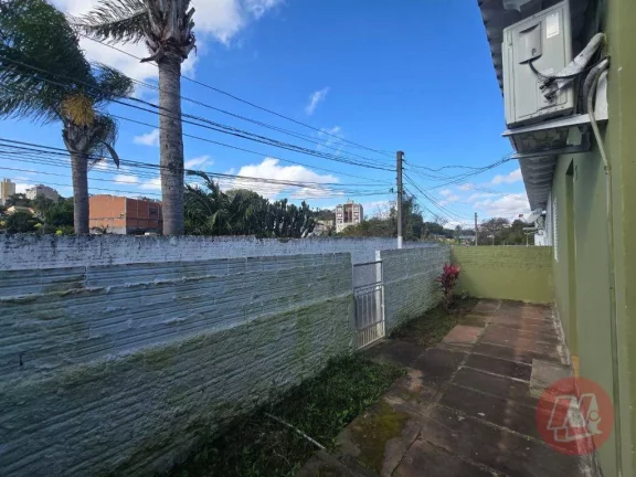 Imagem Casa com 2 dormitórios para alugar, 58 m² por R$ 1.615,00/mês - Medianeira - Porto Alegre/RS